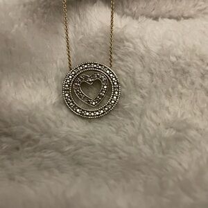 Elegant Gold and Silver Heart Pendant Necklace